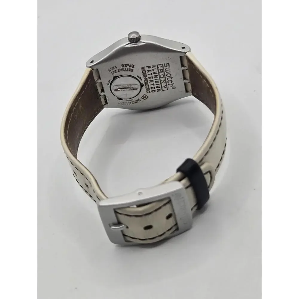 Swatch Women's Silver Case White Strap Watch with Blue Accents